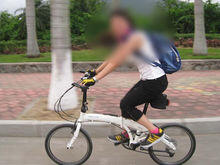 自行车前轮圈上xc是什么意思_自行车前车圈是什么_自行车上的车轮是什么