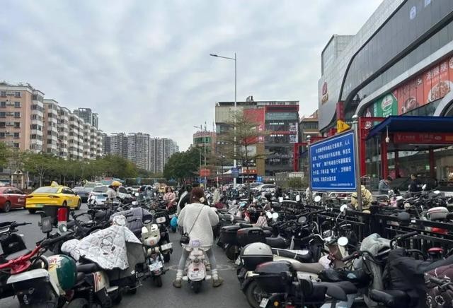 广州电动车两元停车争议_地铁口非机动车收费讨论_上海自行车卡收费标准